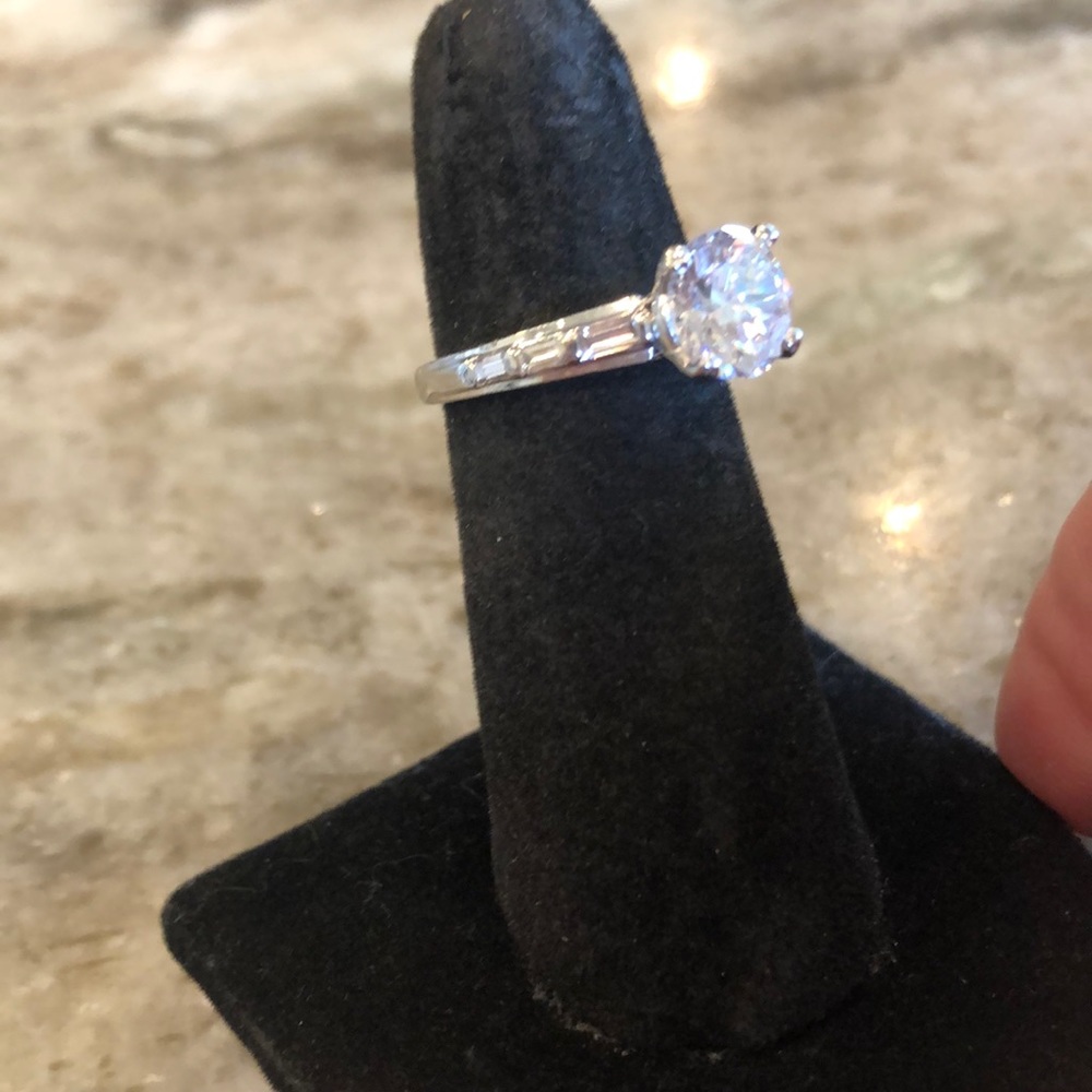 Designer platinum diamond band, CZ is center stone